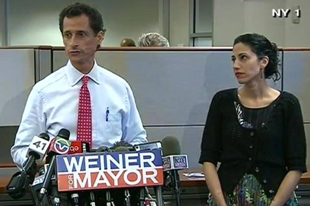 Anthony Weiner and Huma Abedin enjoy the World's Most Awkward press conference.